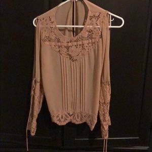 Blouse with cut out arm sleeves